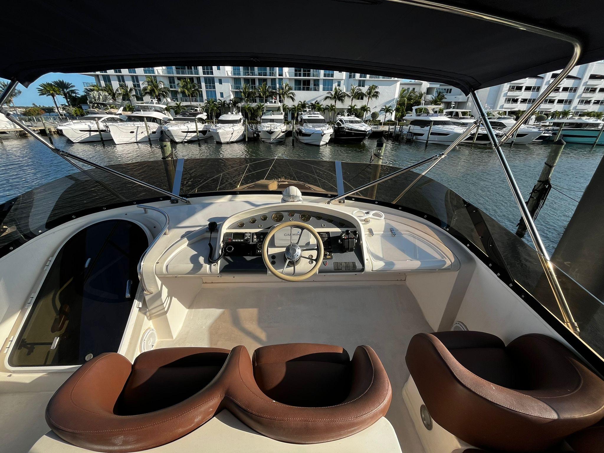 Fairline-Squadron 55 2001 -FL-US-Flybridge of 2001 Fairline Squadron 55 yacht with marina view.-9778674 | Thumbnail