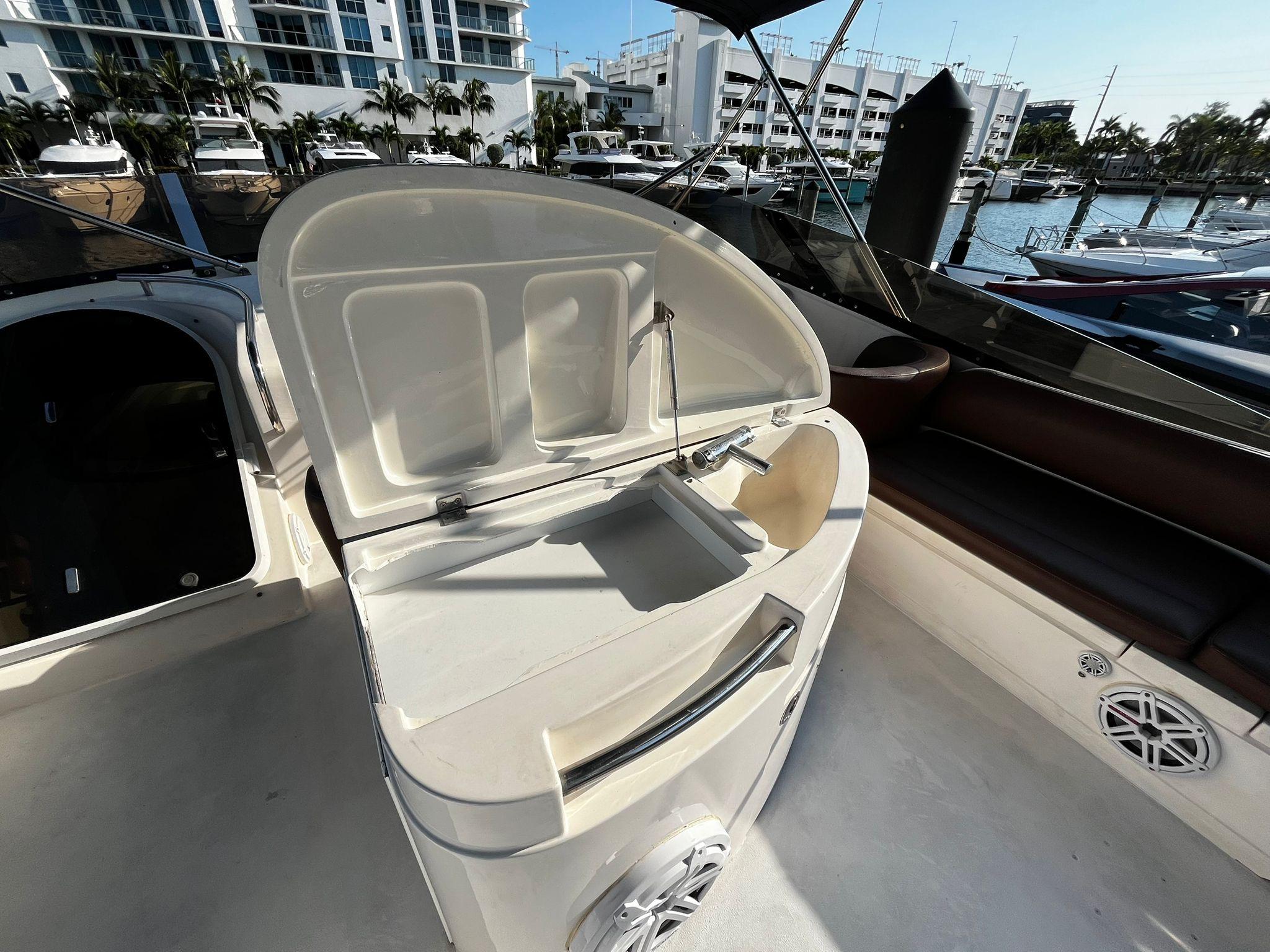 Fairline-Squadron 55 2001 -FL-US-2001 Fairline Squadron 55 yacht interior with open sink and marina view.-9778674 | Thumbnail