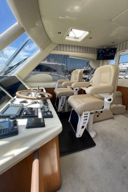 Ocean 57 NANA - Enclosed Flybridge Helm Seating