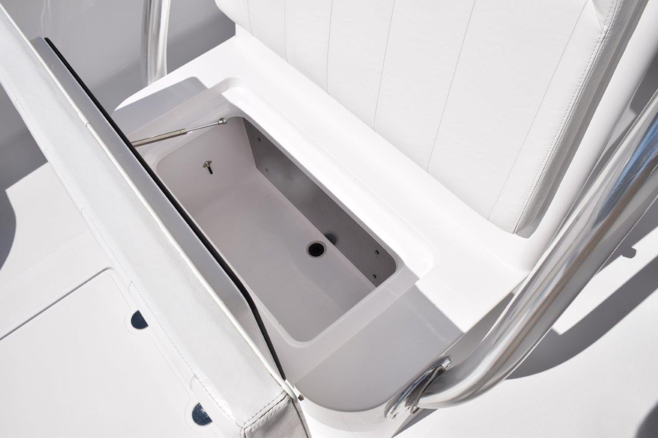 Refrigerated box beneath forward console seat