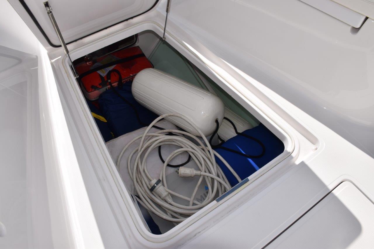 Large underdeck storage box forward