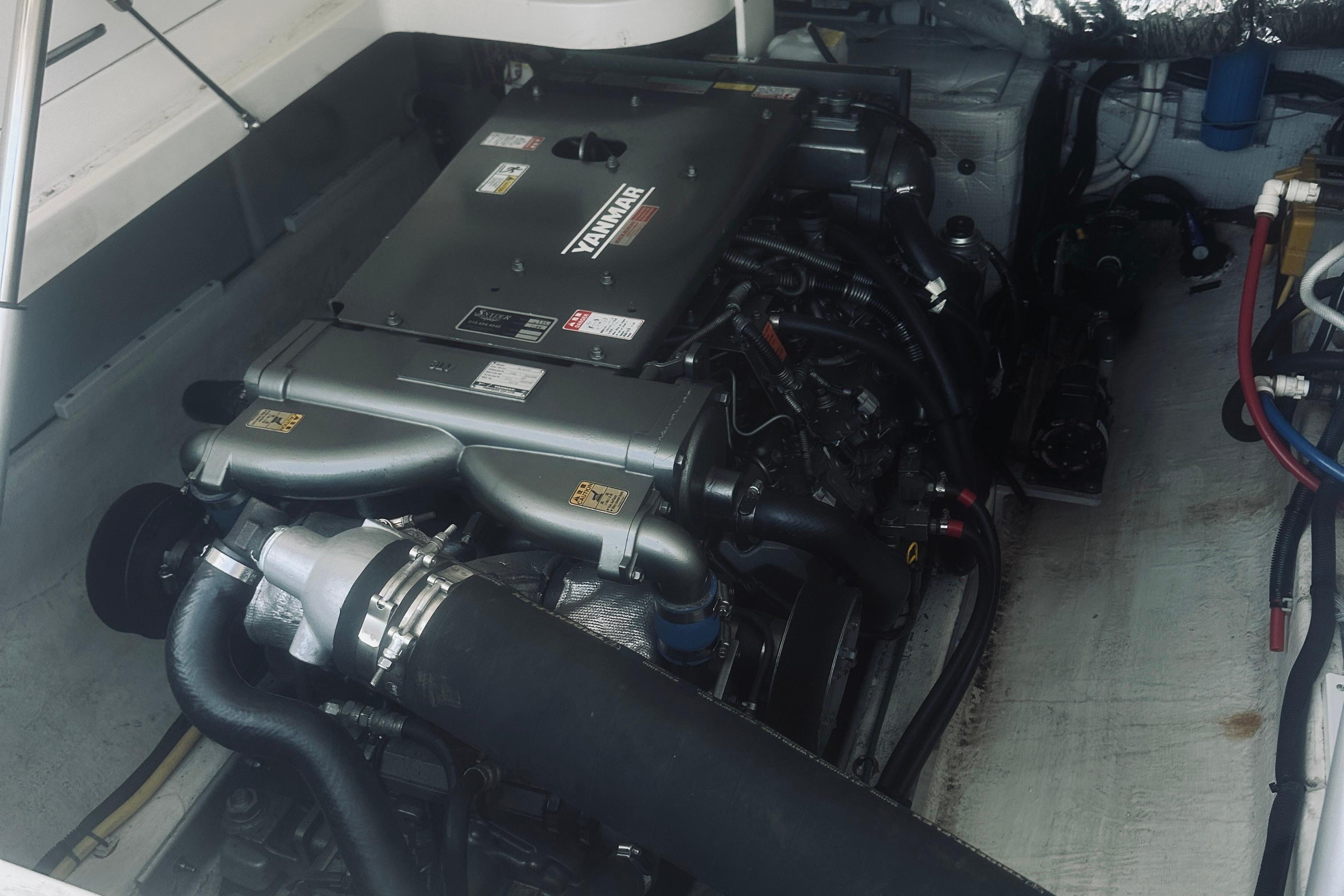 Engine compartment of a 2013 Back Cove 30 boat featuring a Yanmar engine.