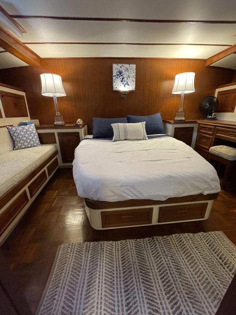VIP stateroom full walk around Queen bed