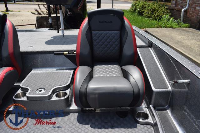 2023 Caymas CX20 Pro boat interior with black and red seating, cup holders, and logo.