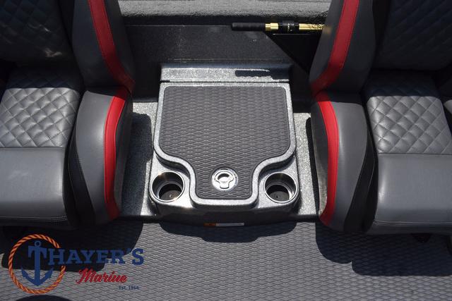 2023 Caymas CX20 Pro boat interior with cup holders and seating.