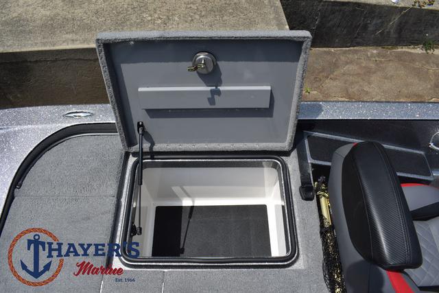 2023 Caymas CX20 Pro boat storage compartment open, featuring Thayer's Marine logo.