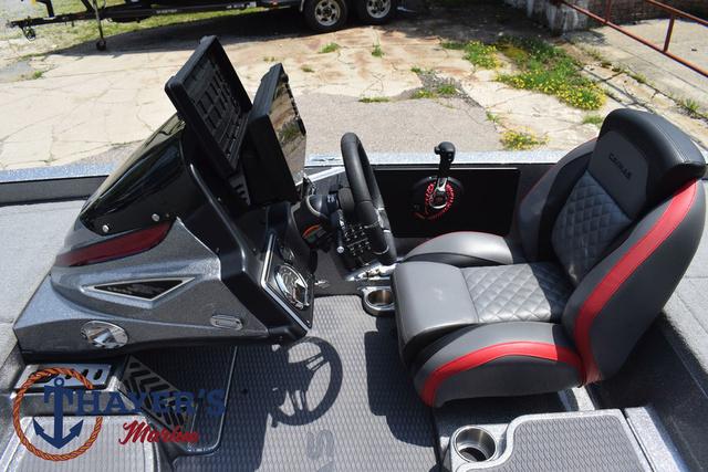 2023 Caymas CX20 Pro boat cockpit with modern controls and comfortable seating.