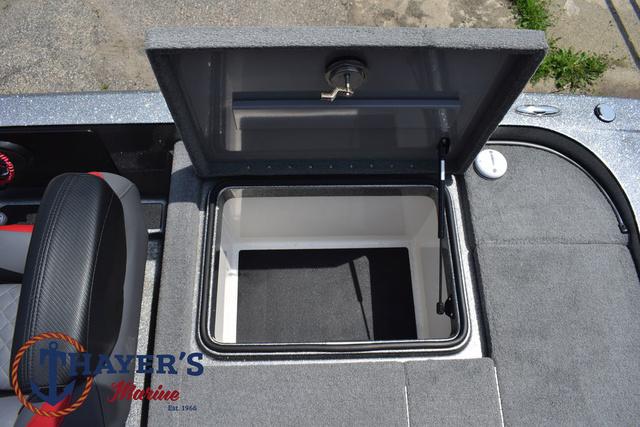 2023 Caymas CX20 Pro boat storage compartment open, showcasing spacious interior.