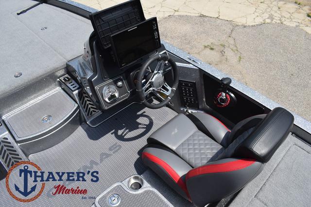 2023 Caymas CX20 Pro boat interior with steering wheel and seat, Thayer's Marine logo visible.