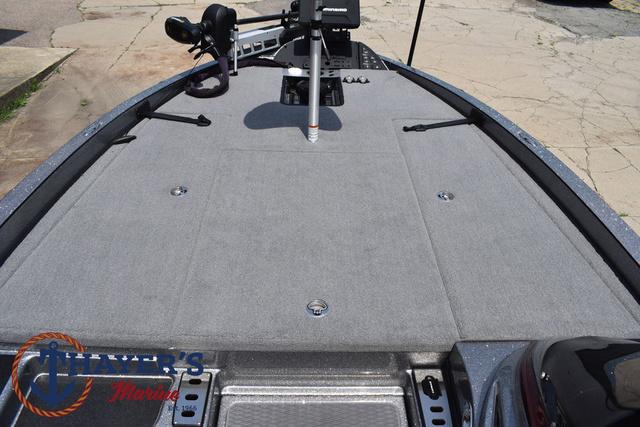 2023 Caymas CX20 Pro boat deck with gray carpeting and fishing equipment.