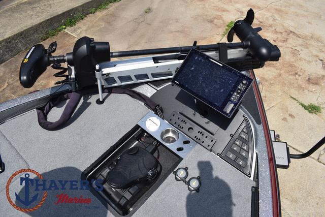 2023 Caymas CX20 Pro boat dashboard with electronics and controls, featuring Thayer's Marine logo.