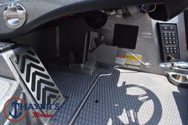 2023 Caymas CX20 Pro boat interior with control panel and footrest, Thayer's Marine logo visible.