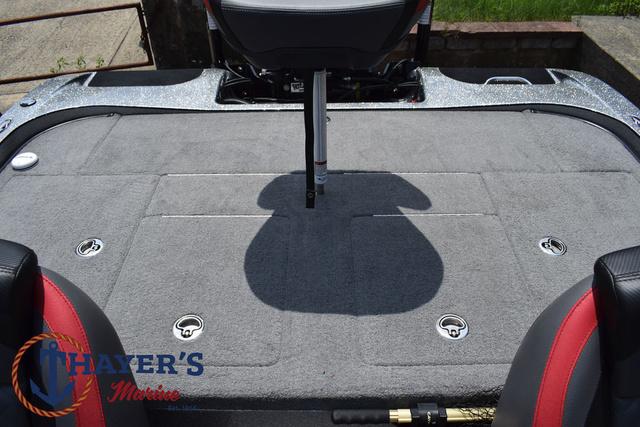 2023 Caymas CX20 Pro boat deck with seating and storage compartments.