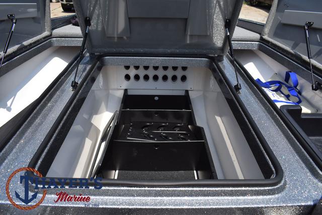 2023 Caymas CX20 Pro boat storage compartment with open lid, showcasing spacious interior.