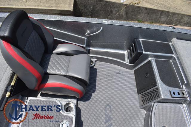 2023 Caymas CX20 Pro boat interior with gray and red seating, featuring Thayer's Marine logo.