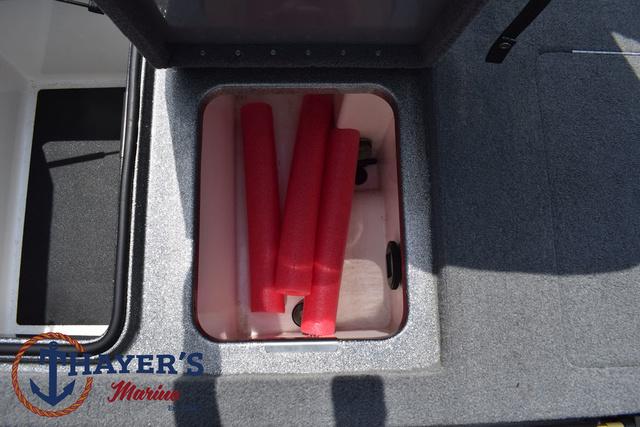 2023 Caymas CX20 Pro storage compartment with red foam noodles inside.