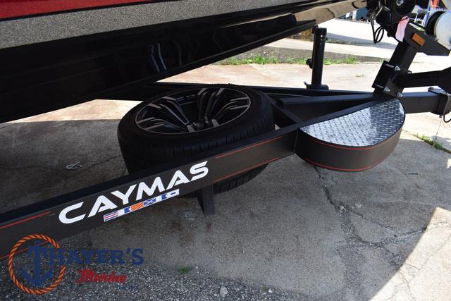 2023 Caymas CX20 Pro trailer with spare tire and branding, parked on concrete.