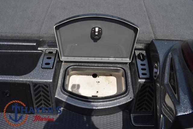 2023 Caymas CX20 Pro boat storage compartment with open lid, showcasing interior details.