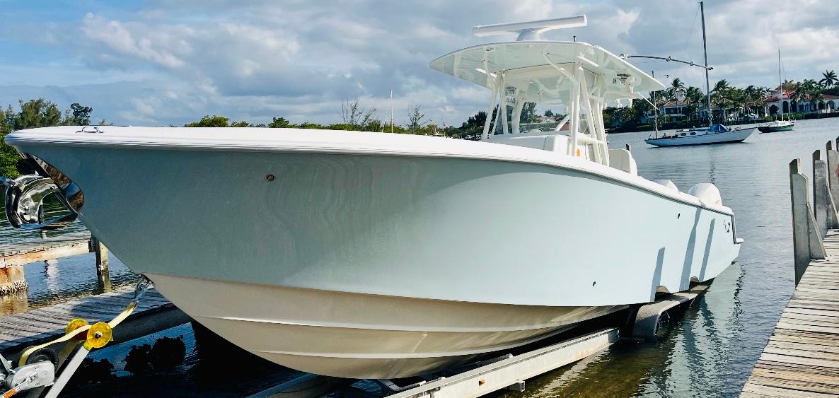 SeaVee-340Z 2024-REEL CRAFT FL-US-2024 SeaVee 340Z boat docked, showcasing sleek design and modern features.-9768819