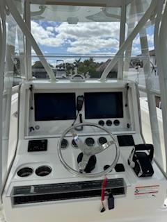 SeaVee-340Z 2024-REEL CRAFT FL-US-2024 SeaVee 340Z boat dashboard with dual screens and steering wheel.-9768819 | Thumbnail