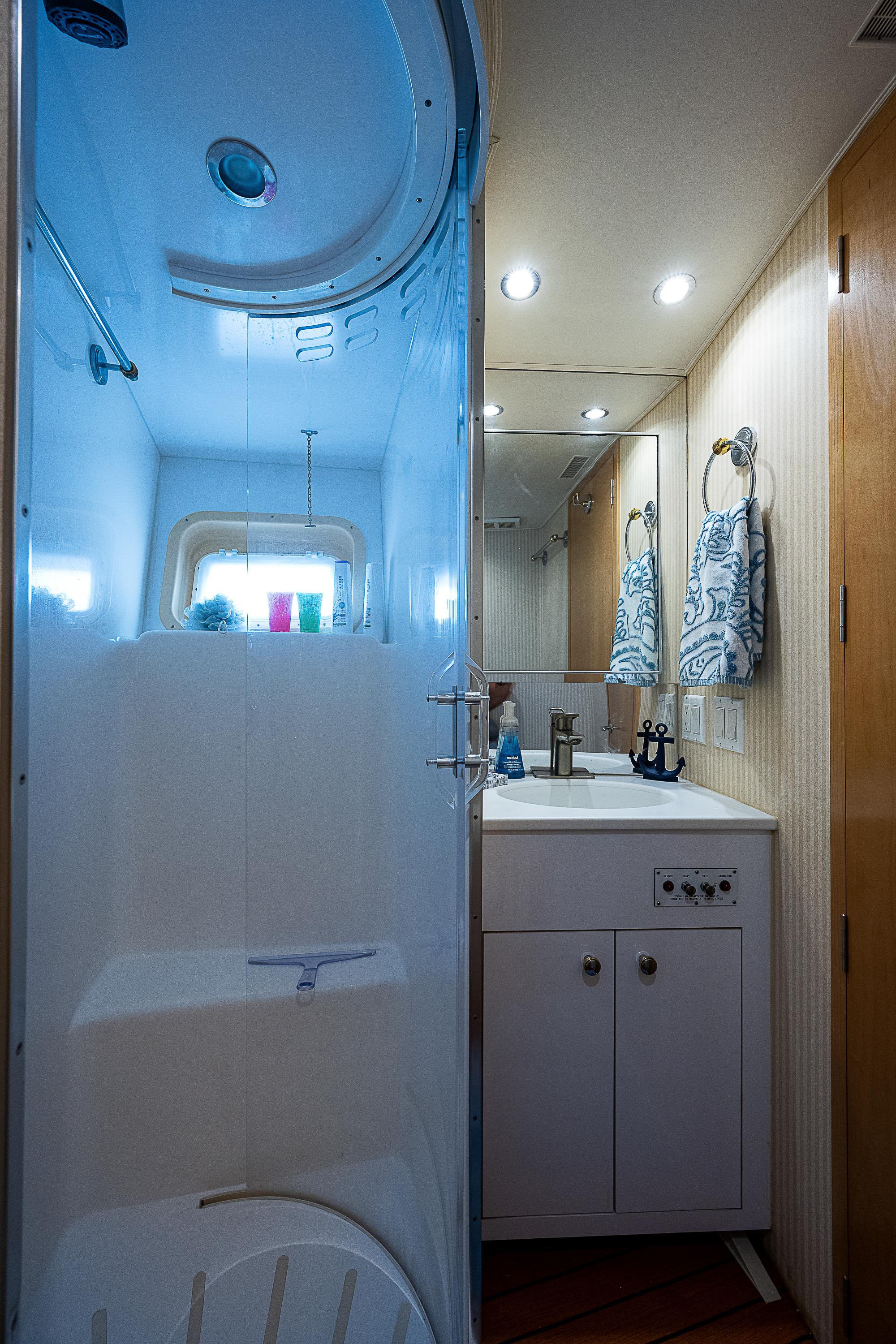 Hatteras 52 Cockpit Motor Yacht Forty Nine Fifty One - Guest Head, Walk In Shower, Vanity with Sink