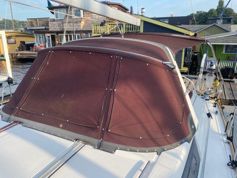 Beneteau-Oceanis 45 2015-Hey Jude III WA-US-2015 Beneteau Oceanis 45 sailboat with maroon canopy docked near waterfront homes.-9598888 | Thumbnail