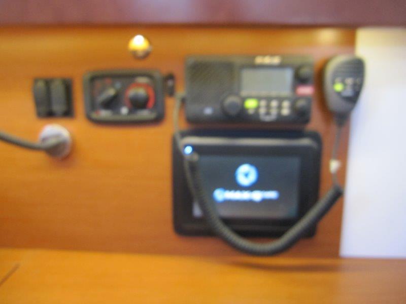Beneteau-Oceanis 45 2015-Hey Jude III WA-US-Control panel of a 2015 Beneteau Oceanis 45 sailboat, featuring navigation and communication equipment.-9598888 | Thumbnail