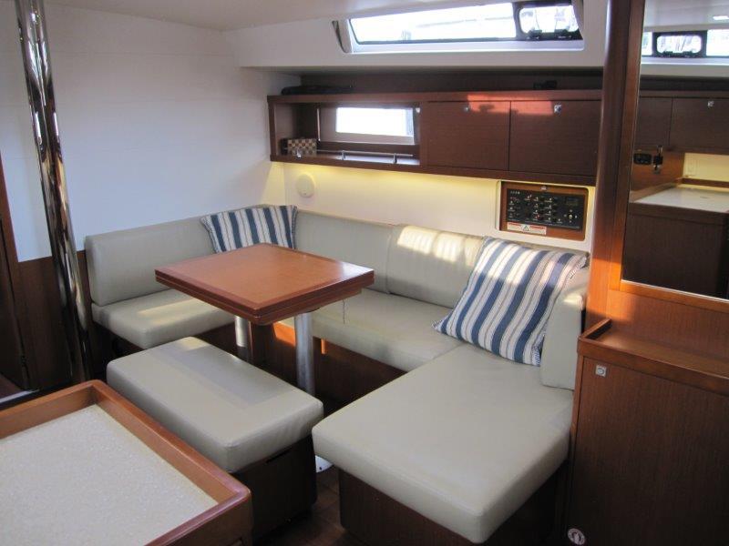 Beneteau-Oceanis 45 2015-Hey Jude III WA-US-Interior of 2015 Beneteau Oceanis 45 yacht with cozy seating and wooden table.-9598888 | Thumbnail