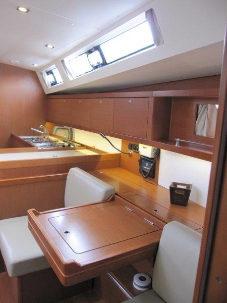 Beneteau-Oceanis 45 2015-Hey Jude III WA-US-Interior of 2015 Beneteau Oceanis 45 yacht, featuring a modern kitchen and dining area.-9598888 | Thumbnail