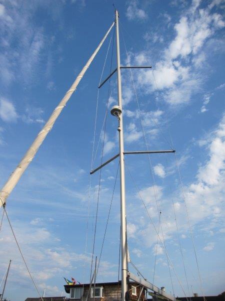 Beneteau-Oceanis 45 2015-Hey Jude III WA-US-Mast of 2015 Beneteau Oceanis 45 sailboat against a blue sky with clouds.-9598888 | Thumbnail