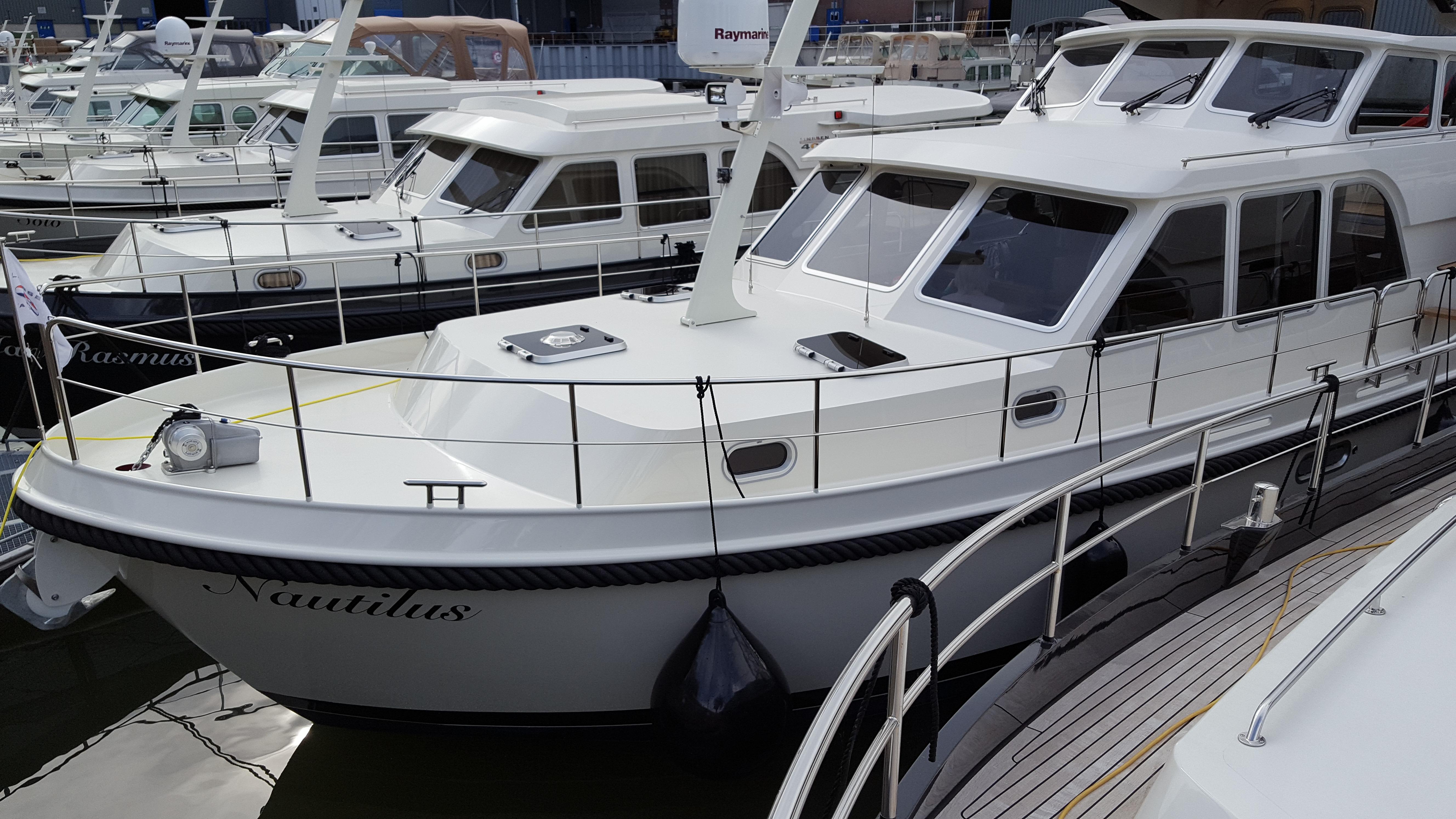 2016 Linssen Grand Sturdy 410 AC Variotop yacht docked at marina.
