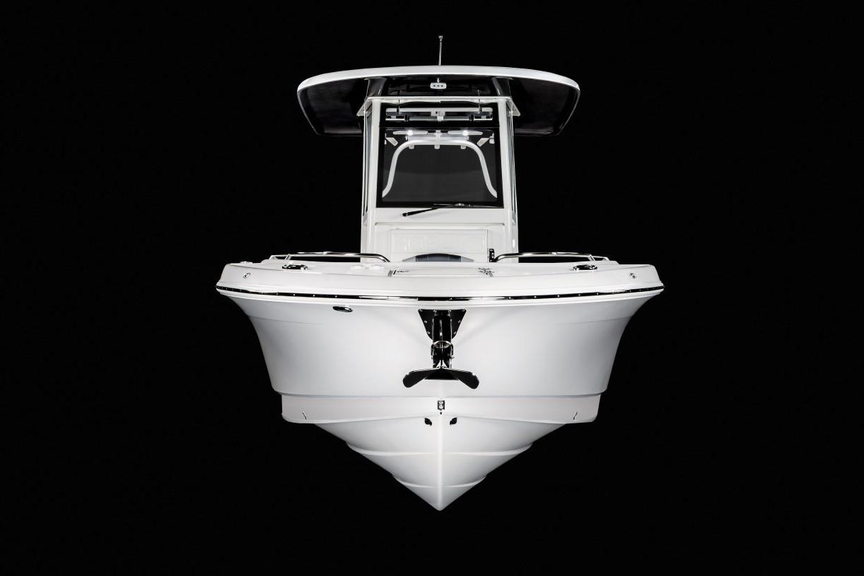 Manufacturer Provided Image: 2022 Robalo R272 Center Console boat front view on black background.