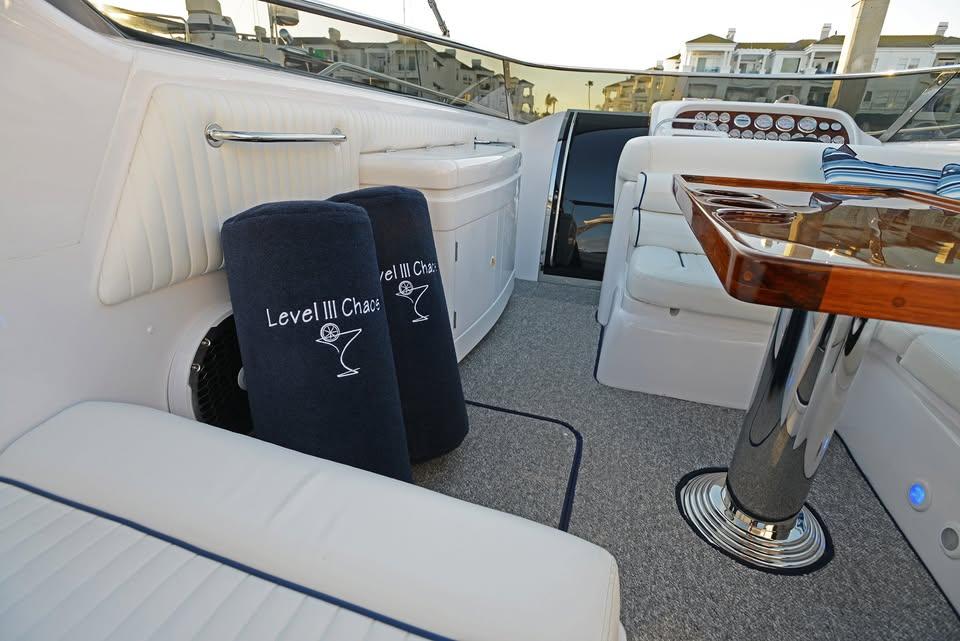 Luxurious interior of 1994 Sunseeker Apache 45 yacht with elegant seating and polished table.