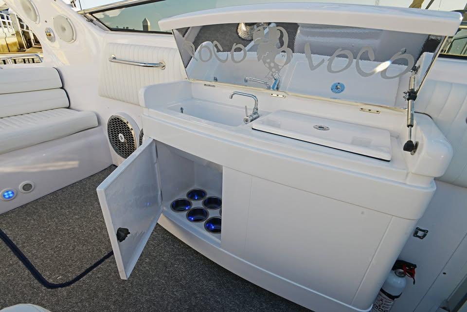 Interior of 1994 Sunseeker Apache 45 yacht with sink and storage cabinet.