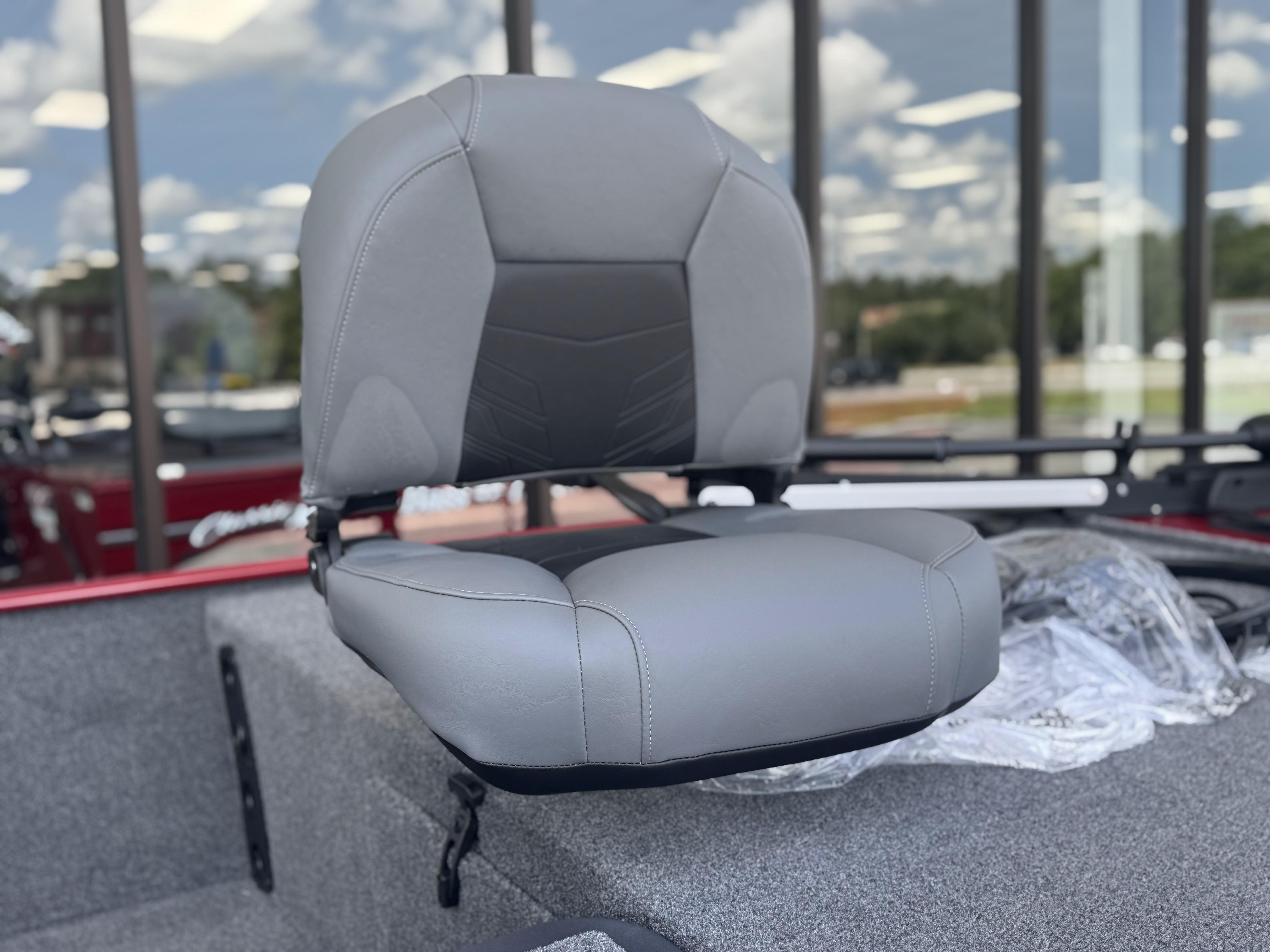 2025 Tracker Bass Tracker Classic XL boat seat, gray upholstery, outdoor setting.