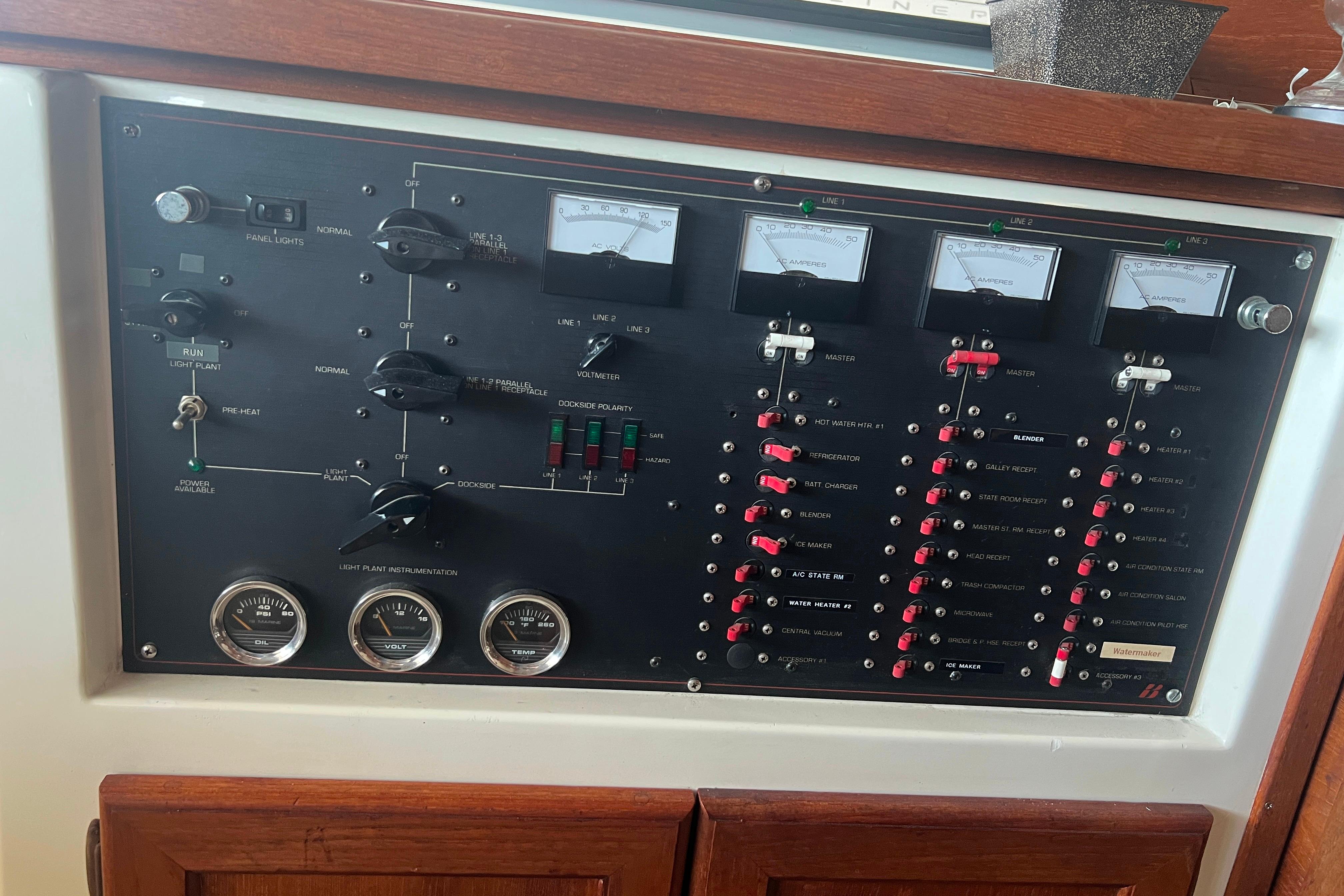 Control panel of a 1986 Bayliner 4550 Motoryacht with gauges and switches.