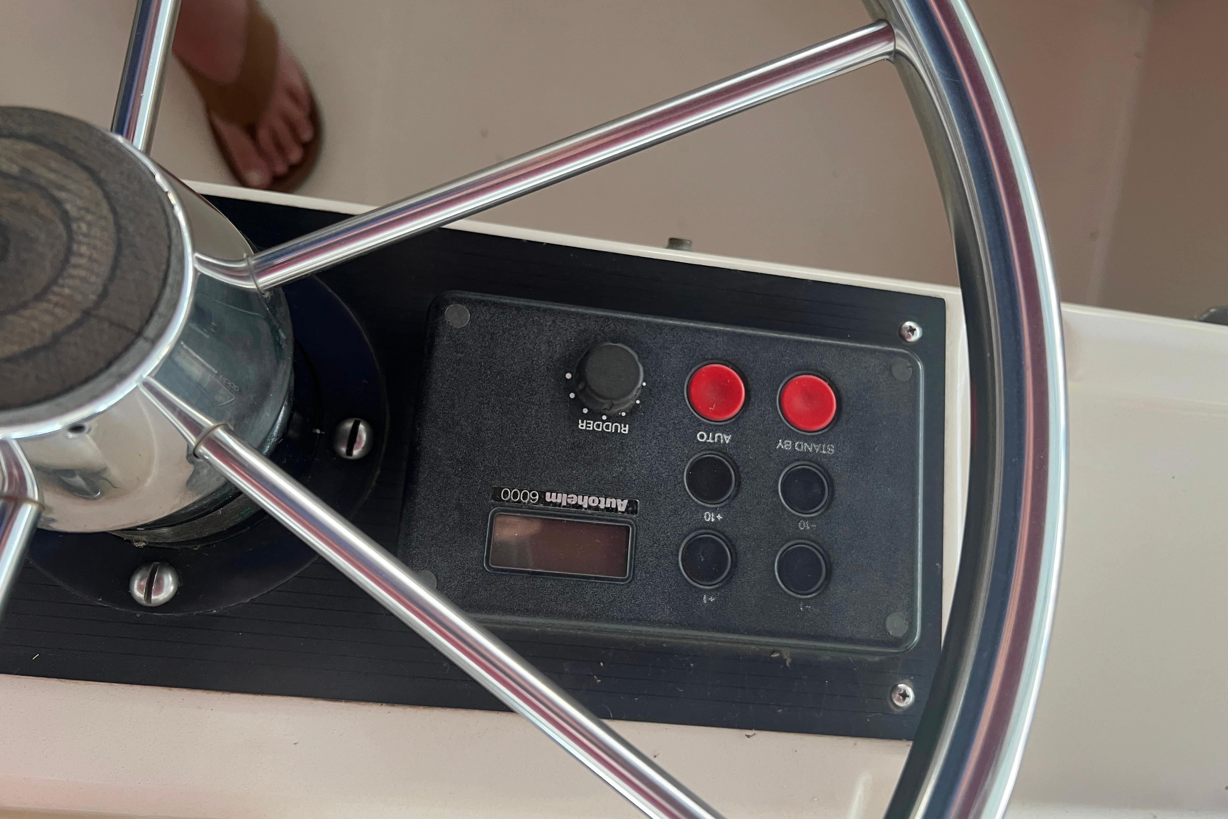 Steering wheel and control panel of 1986 Bayliner 4550 Motoryacht.