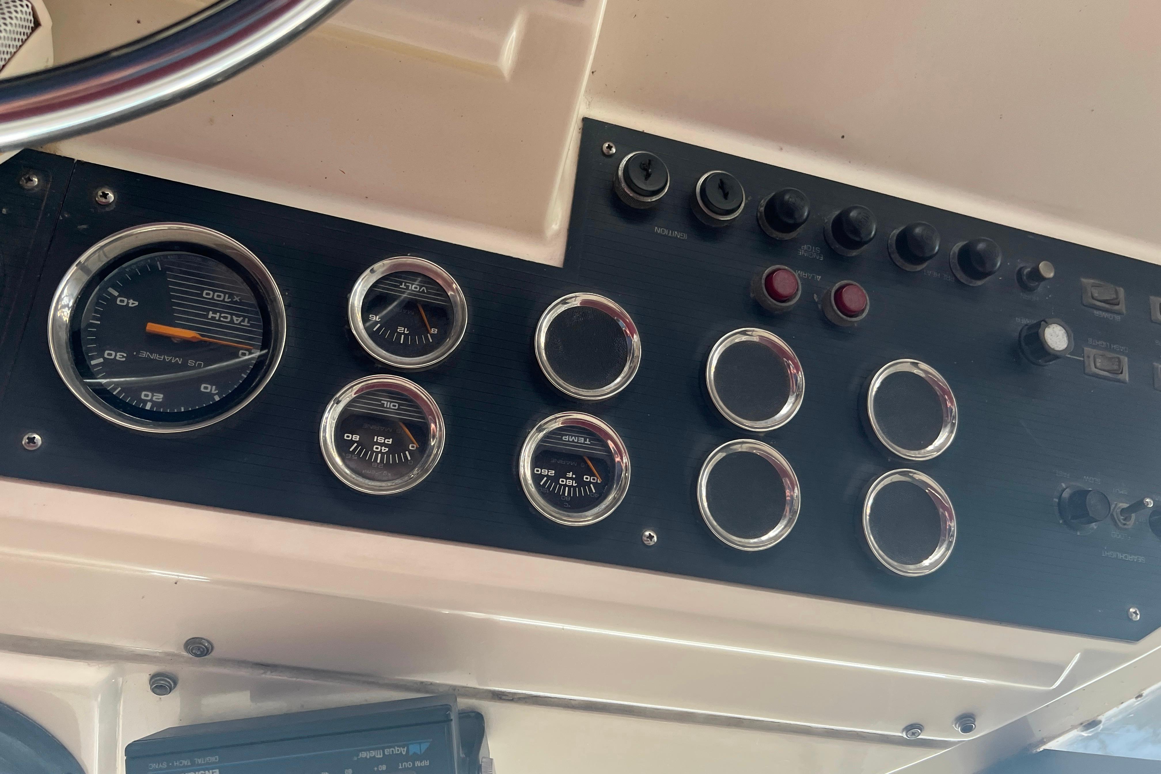 1986 Bayliner 4550 Motoryacht dashboard with gauges and controls.