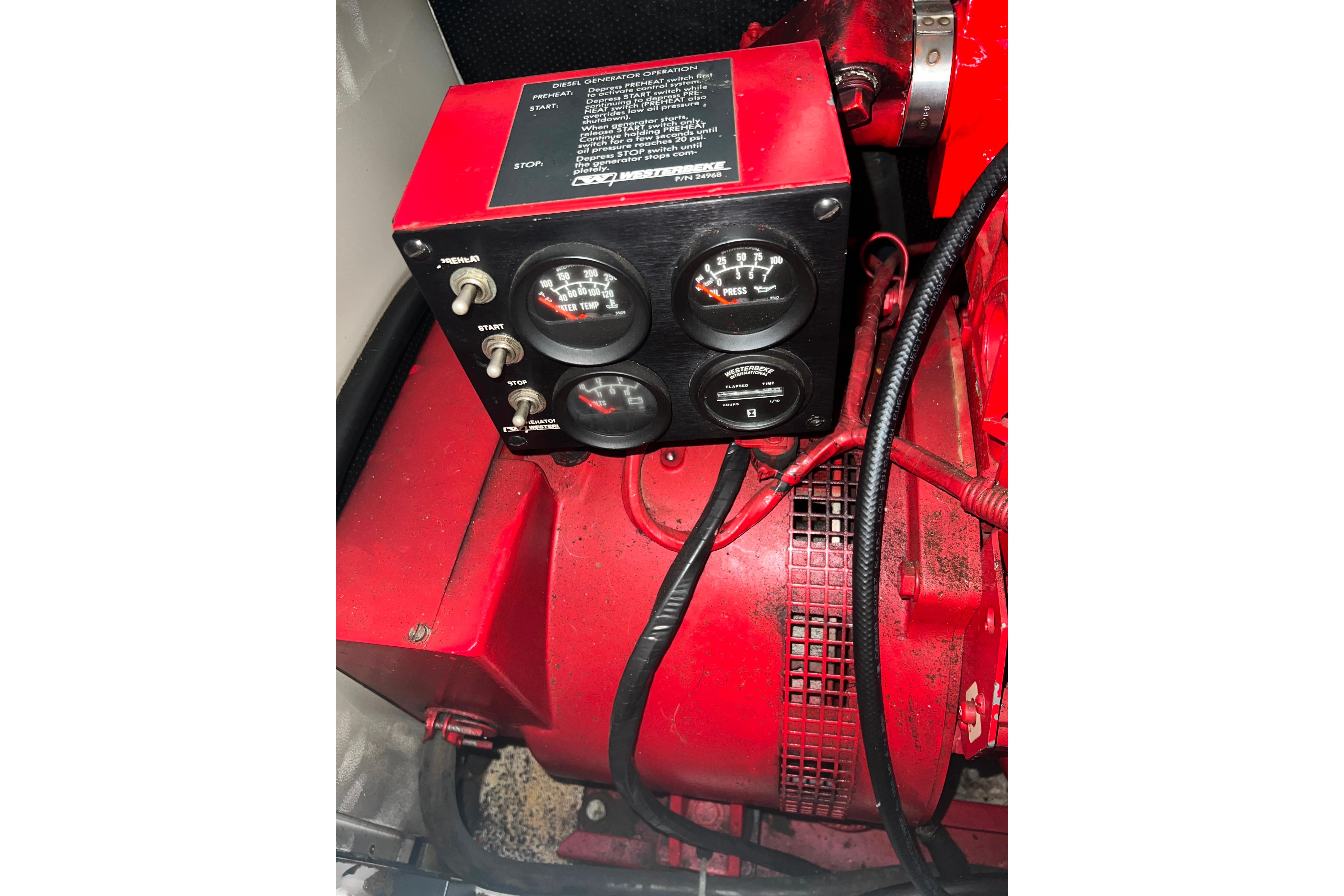 Engine control panel of 1986 Bayliner 4550 Motoryacht, featuring gauges and switches.