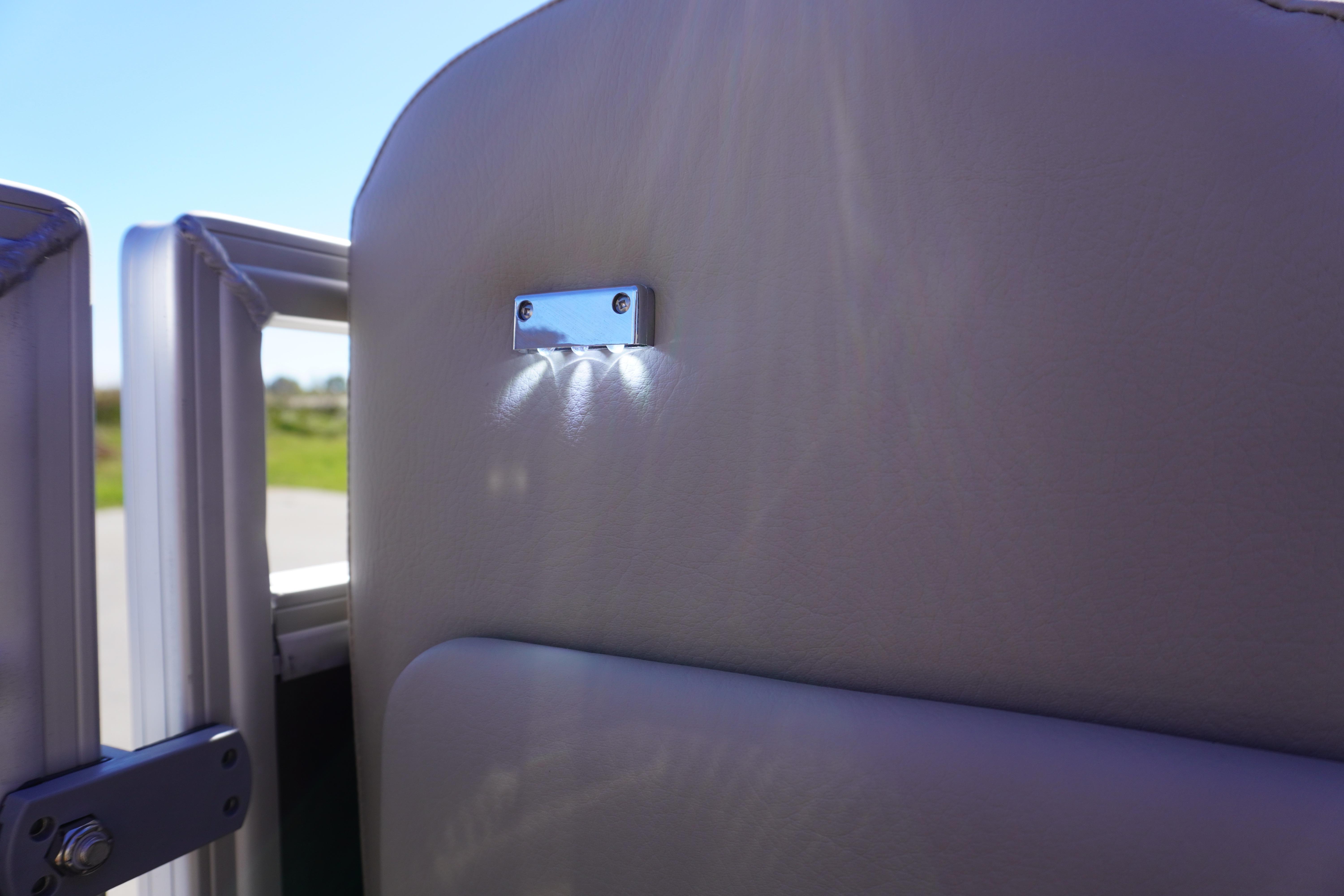 2024 Sun Tracker Party Barge 20 DLX interior detail with LED lighting.