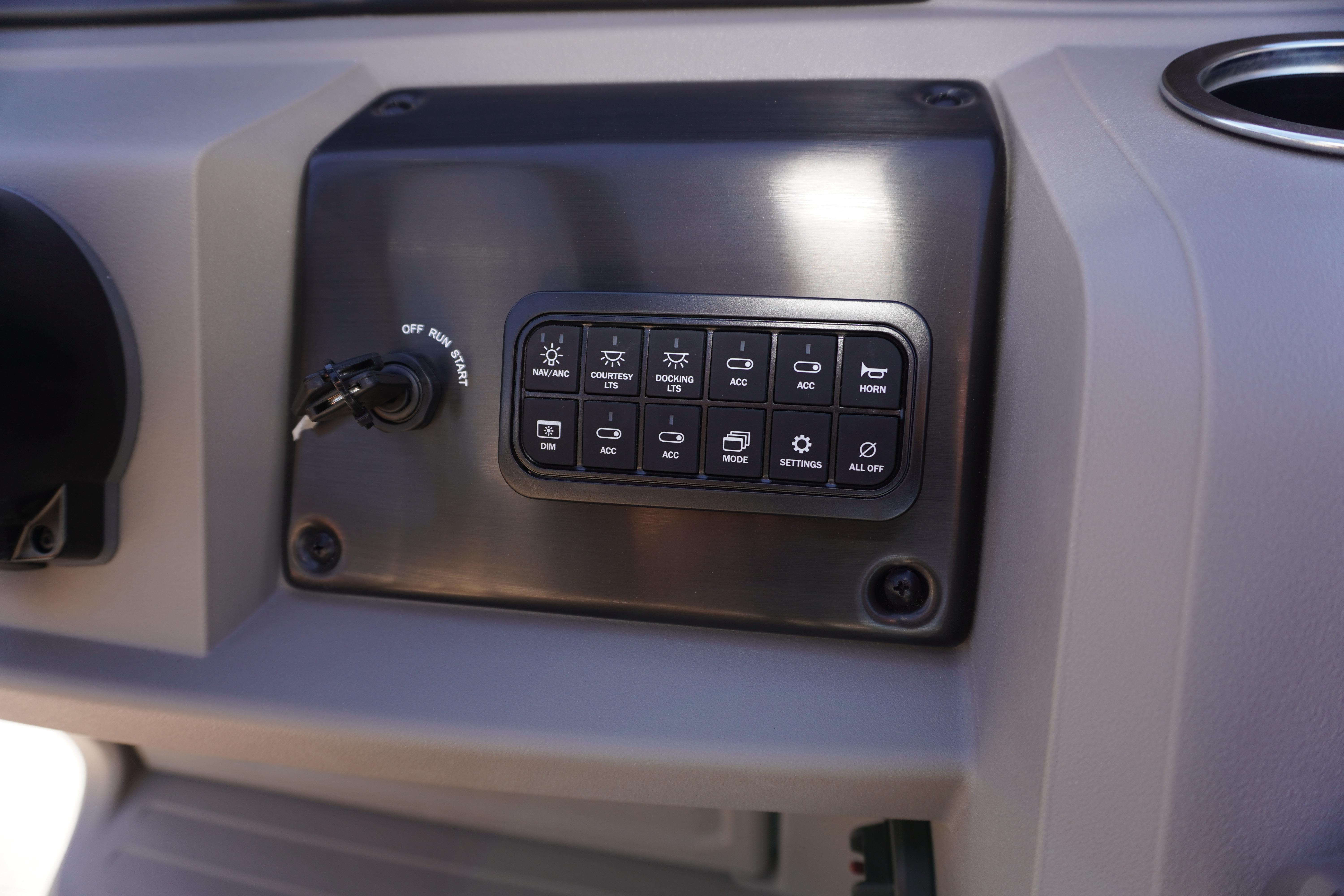 Control panel of 2024 Sun Tracker Party Barge 20 DLX with various function buttons.