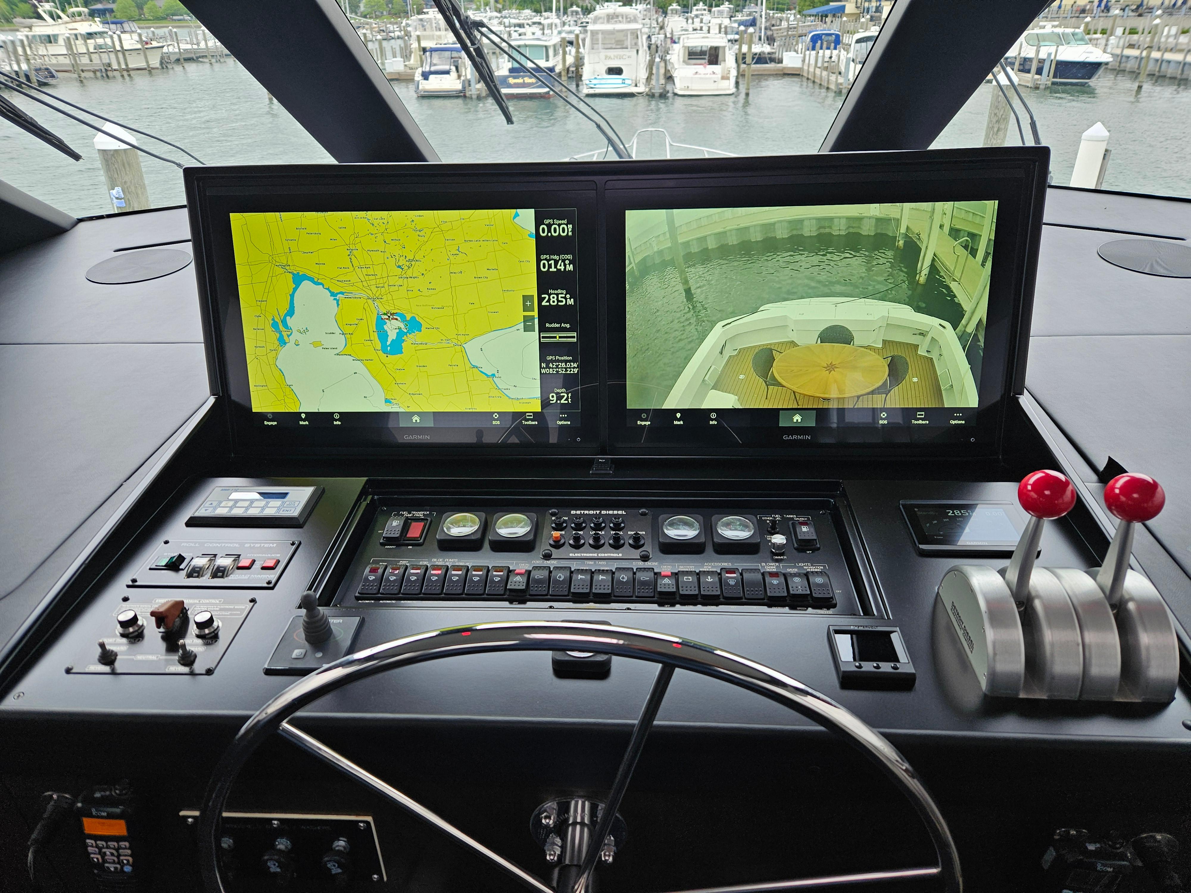 Hatteras-70 Convertible 1999-Soteria MI-US-Cockpit of 1999 Hatteras 70 Convertible yacht with navigation screens and controls.-9578969 | Thumbnail