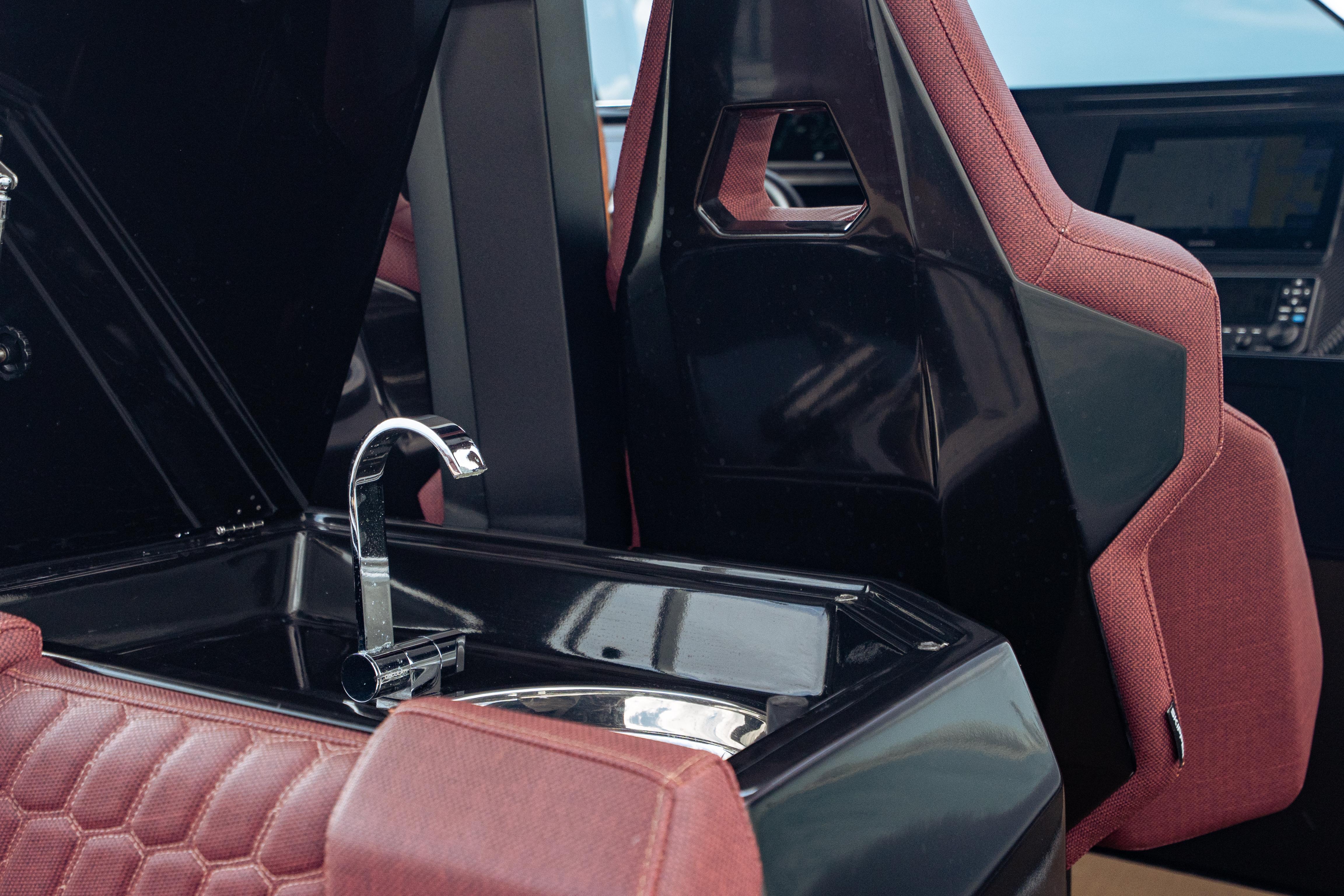 Skipper-BSK-42NC 2023 -FL-US-Luxury interior of 2023 Skipper-BSK 42NC boat with sleek sink and maroon seating.-9768987 | Thumbnail