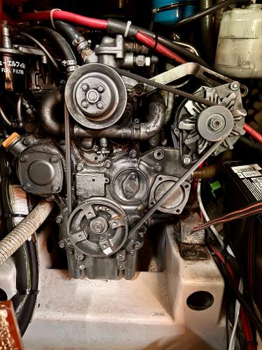 Engine of 1996 Beneteau Oceanis 40 CC sailboat, detailed view with belts and components.