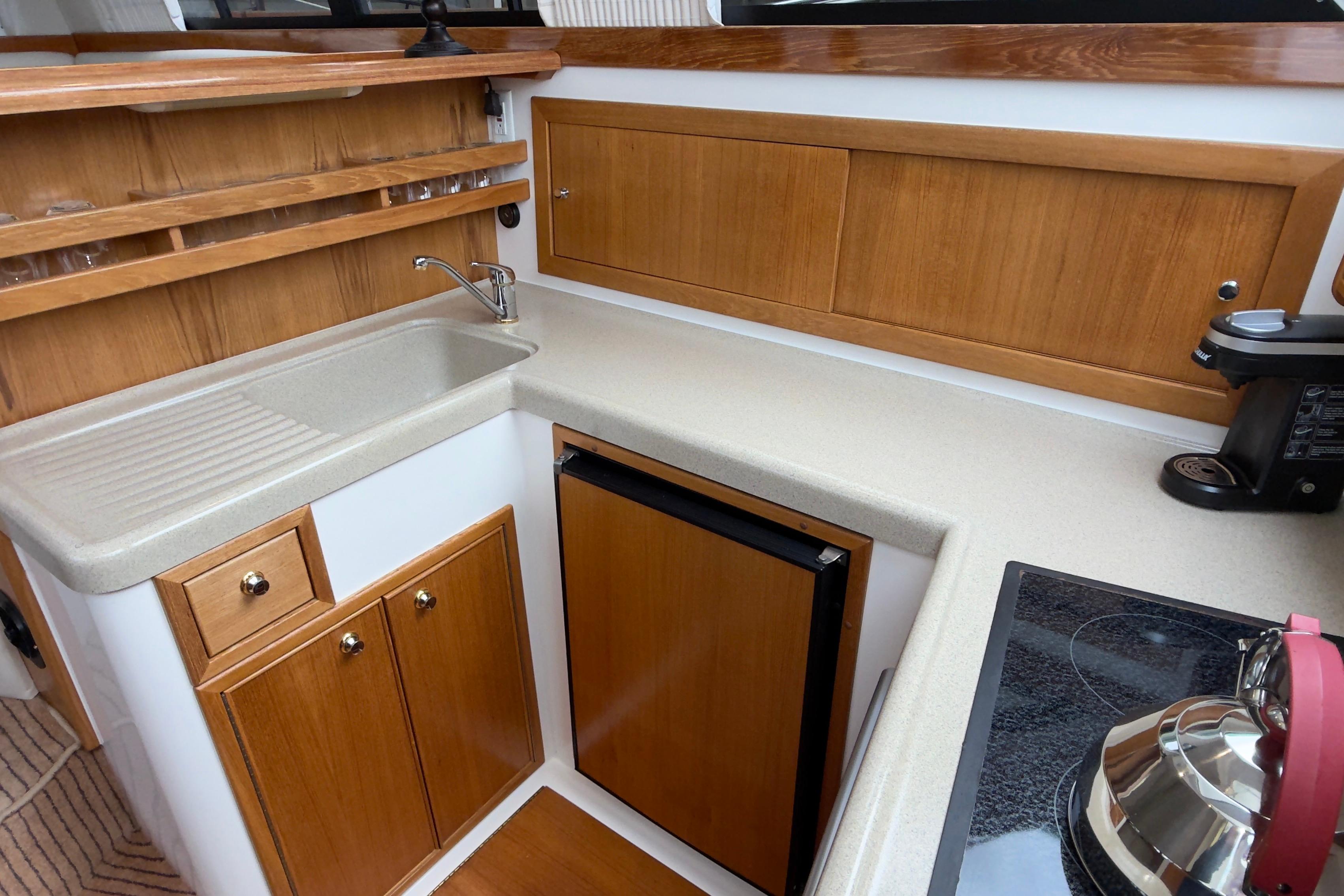 2001 Riviera Twin Cabin Convertible #TBTW366101 inventory image at Sun Country Yachts, South Lake Union (Seattle)