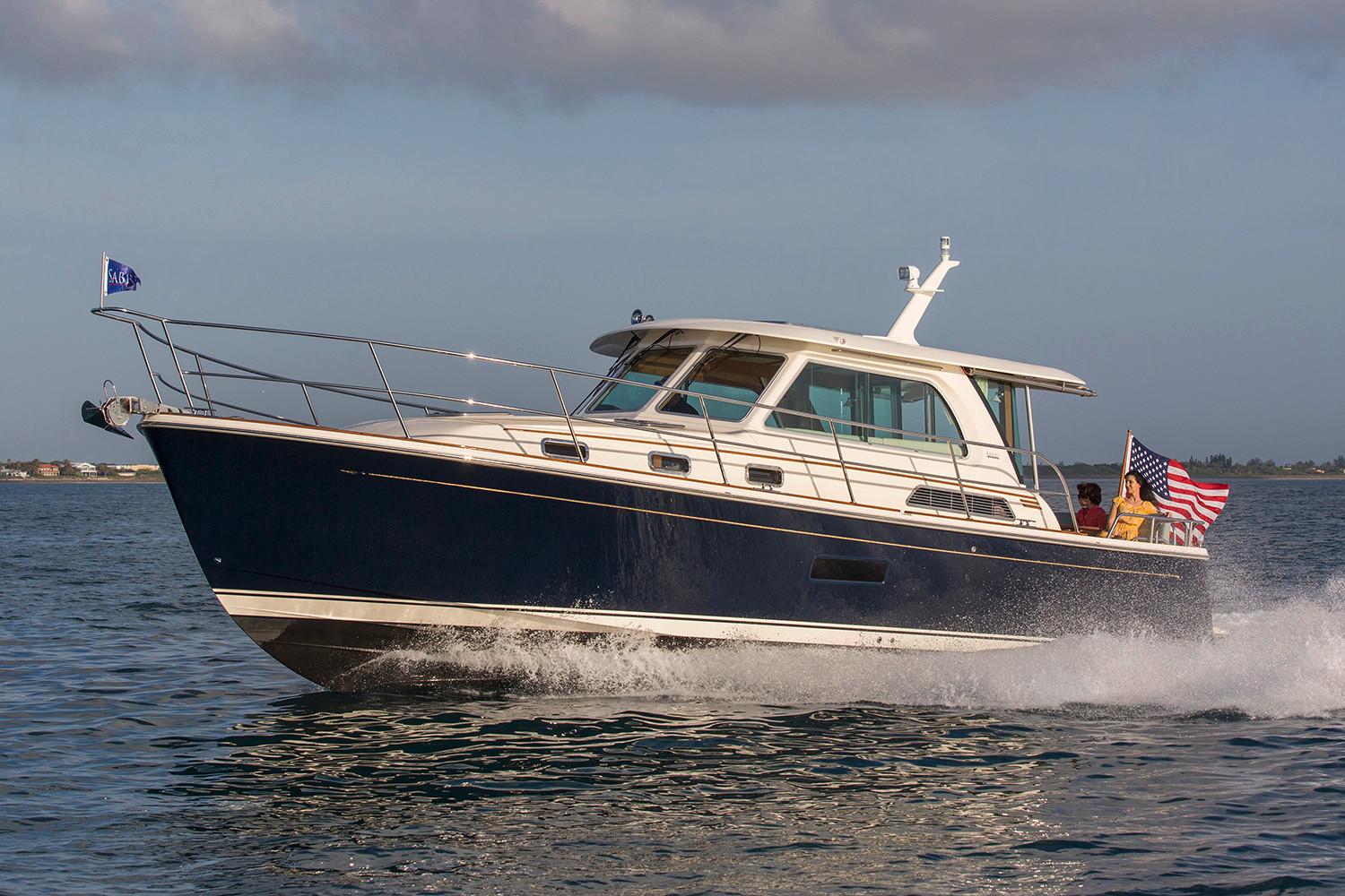 Manufacturer Provided Image: 2026 Sabre 38 Salon Express cruising on open water, displaying sleek design and American flag.