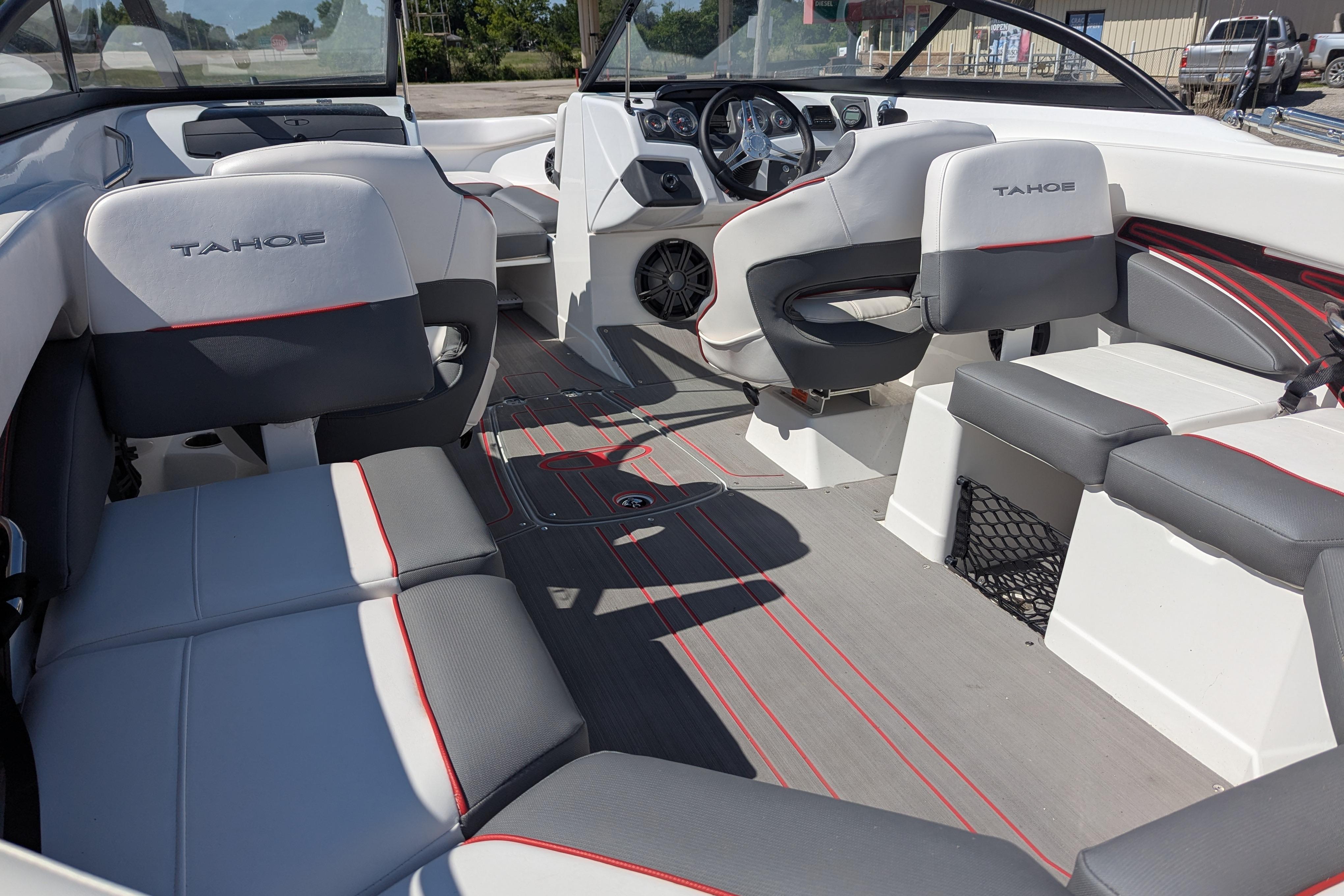 Interior of 2022 Tahoe 210 S boat with modern seating and dashboard.