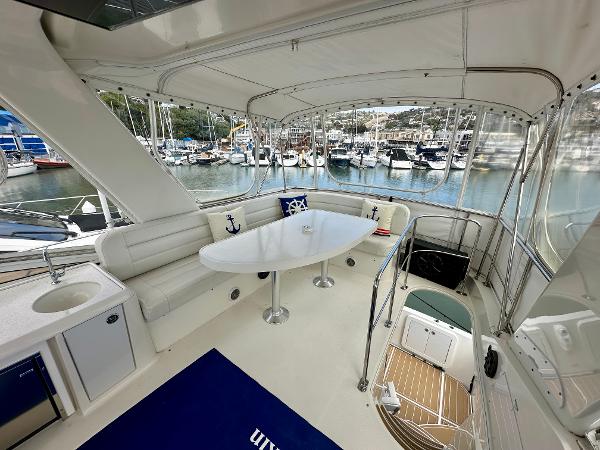 Luxurious 2008 Carver 43 Super Sport yacht interior with marina view.