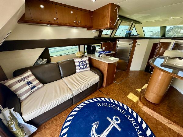 Interior of 2008 Carver 43 Super Sport yacht with modern furnishings and nautical decor.