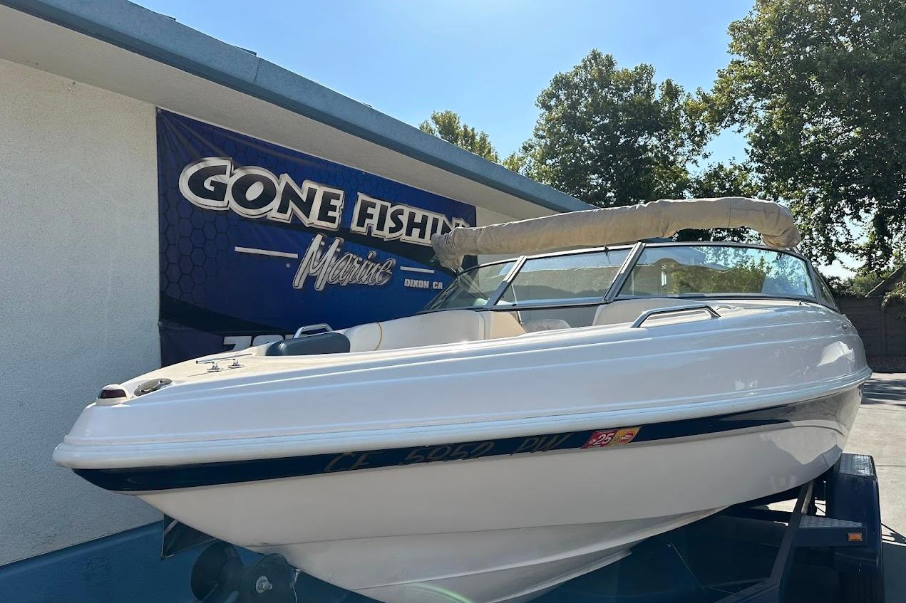 2002 Rinker 212 Captiva boat displayed at Gone Fishing Marine dealership.